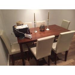 Almost new barely used dining table and chairs