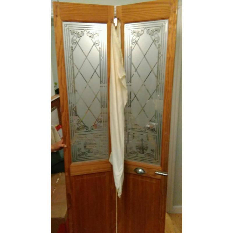 Pine folding door with art deco style glass