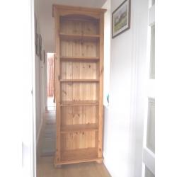 Bookcase of solid pine with six shelves, for sale following house move. In excellent condition.