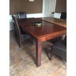 Dark wood dining table