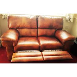 Genuine Italian luxury tan leather. 2 seater reclining sofa