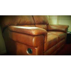 Genuine Italian luxury tan leather. 2 seater reclining sofa