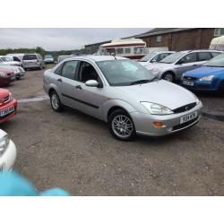 Ford Focus with a boot in vgcondition black leather 1 yrs mot alloys drives superb elec Windows etc