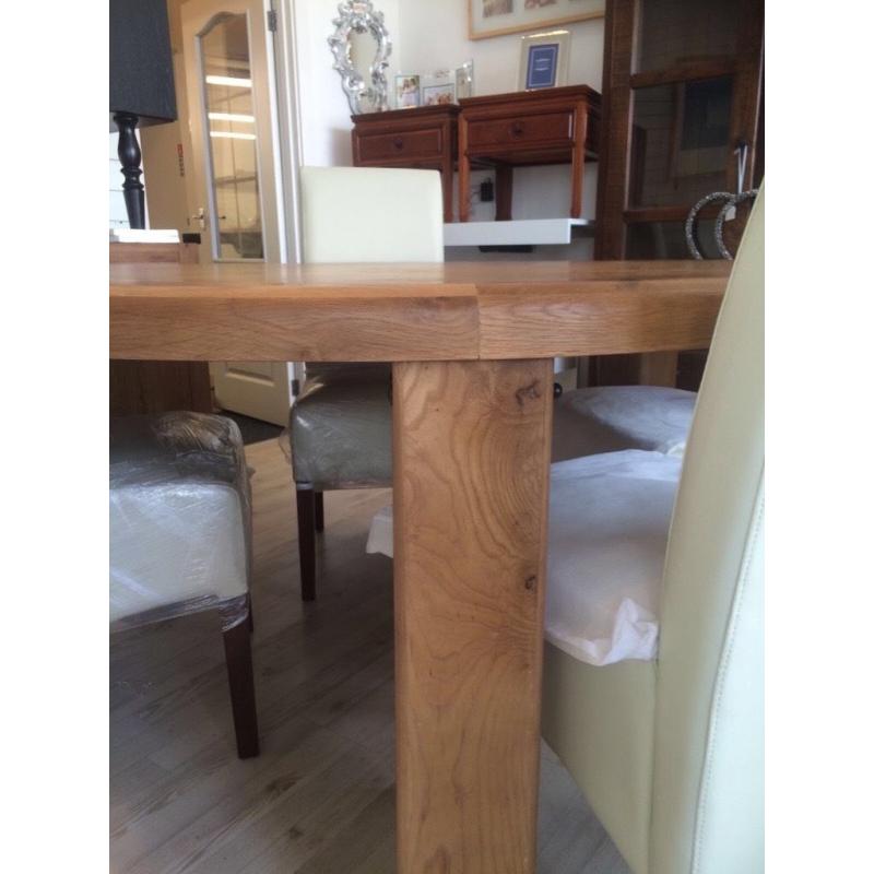 Brand new solid oak round table & 4 chairs