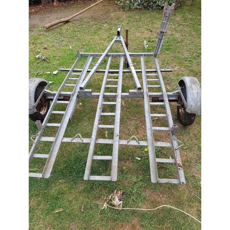 2 bike motorcycle trailer with center rail and corner posts for box.