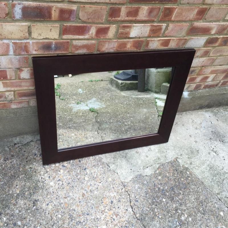 Brown wooden mirror