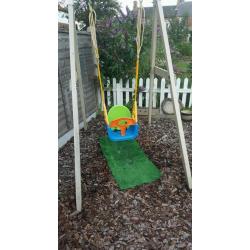 Children's wooden swing