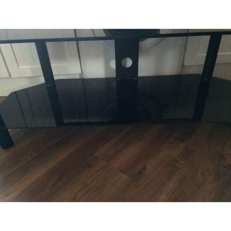 Large black glass TVs stand, used for 55" lg tv from currys