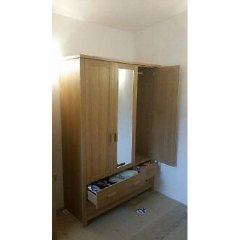 1 three door wardrobe with mirror & four draws. Not flat packed in immaculate condition. QUICK SALE