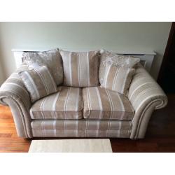 2 seater cream and oatmeal fabric sofa with scatter cushions