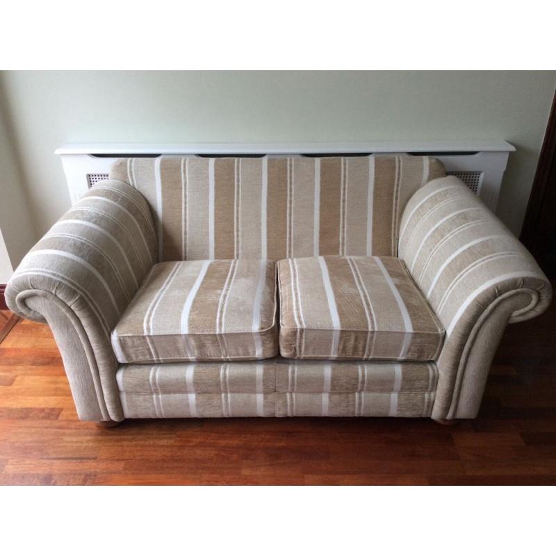 2 seater cream and oatmeal fabric sofa with scatter cushions