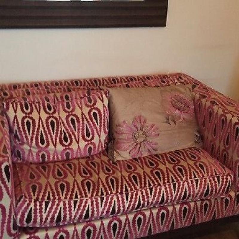 Two seater suite with foot stool