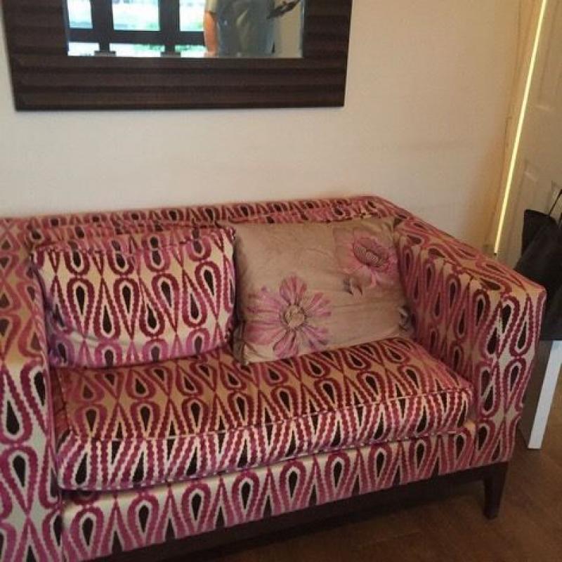 Two seater suite with foot stool