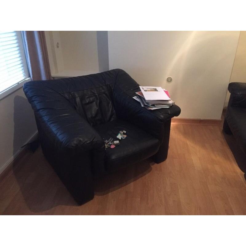 Black leather sofa and armchair