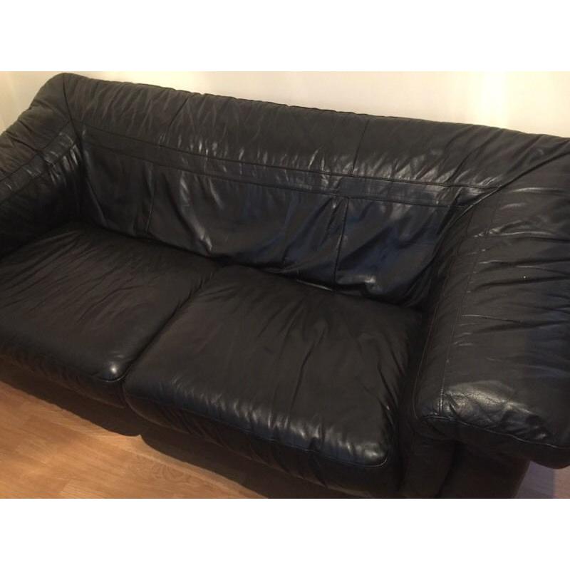 Black leather sofa and armchair