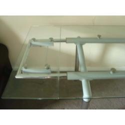 Glass extendable dining table