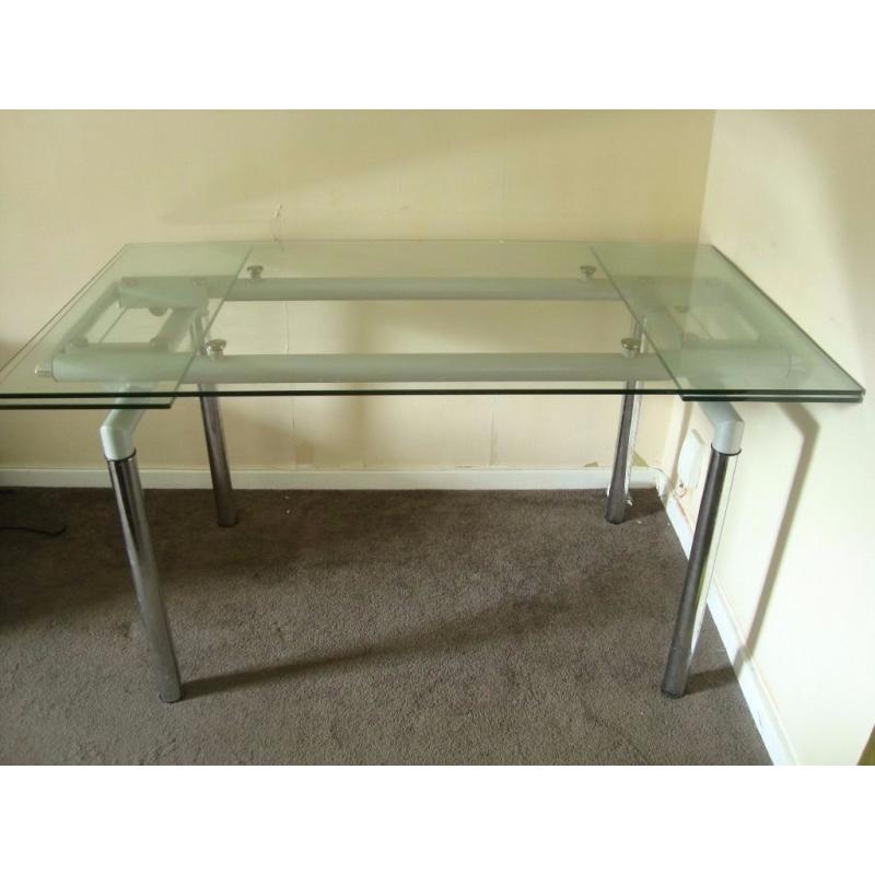 Glass extendable dining table