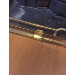 Brass adjustable fender fire surround